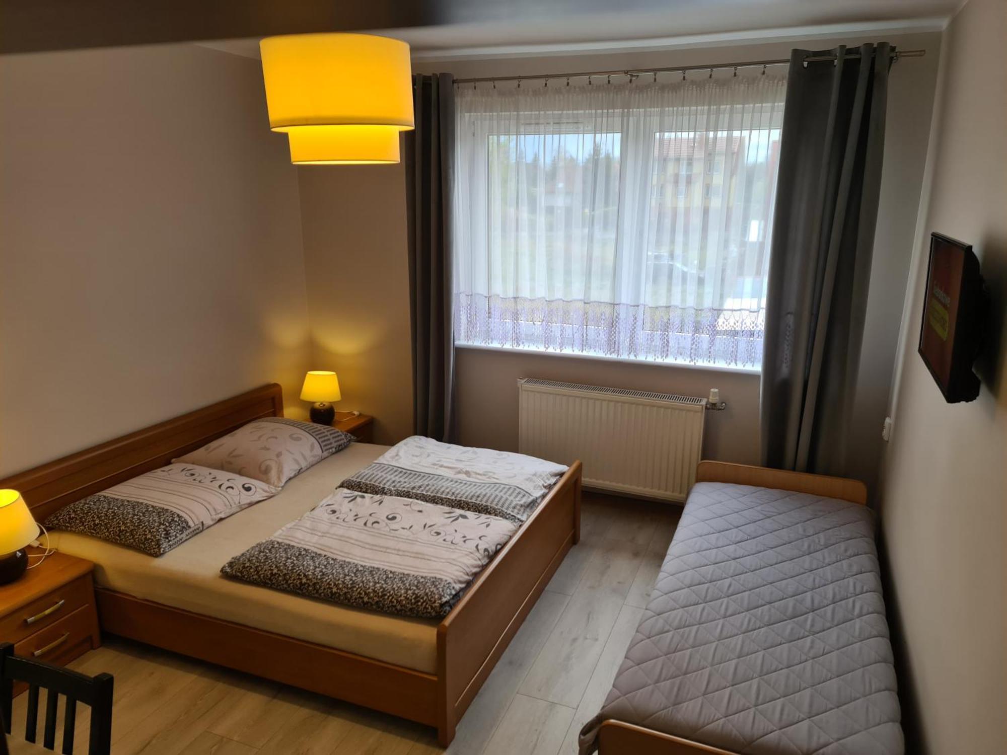 Pokoje Zacisze Lesne Стеґна Номер фото